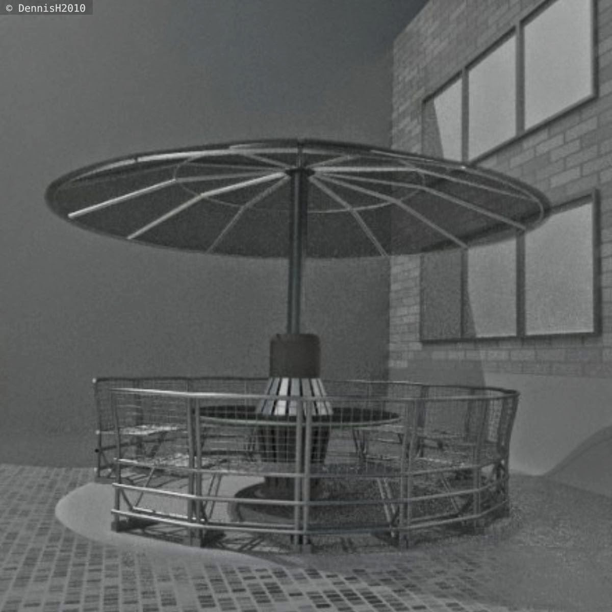  A round bench made of stainless steel with a rigged rain/sun protection by DennisH2010