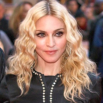 Madonna may face a lawsuit over her latest single Give Me All Your Luvin'