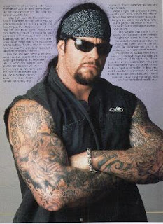 The Undertaker tattoos - WWE Superstar Undertaker Tattoo Designs