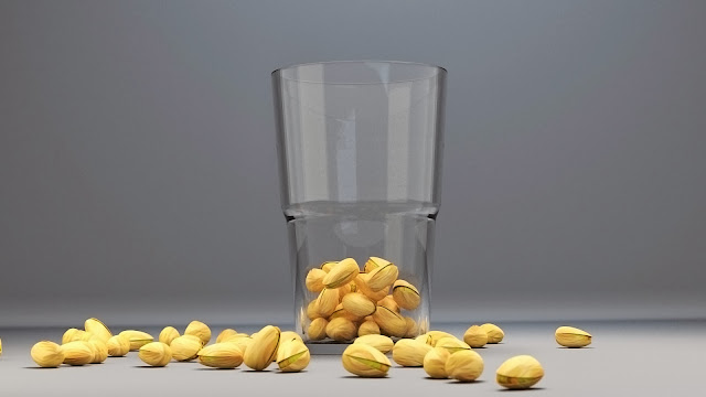 Pistachios in a glass Image of some pistachios in a glass
