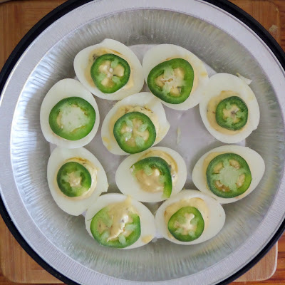 Jalapeno Deviled Eggs:  Hard-boiled eggs, split, and the whites filled with a spicy jalapeno yolk mixture.