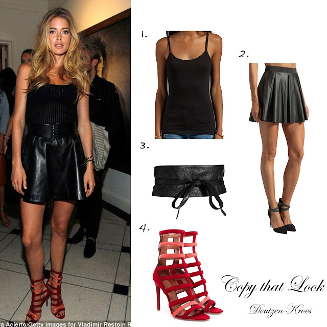 Doutzen Kroes wearing black leather skirt and red gladiator sandals