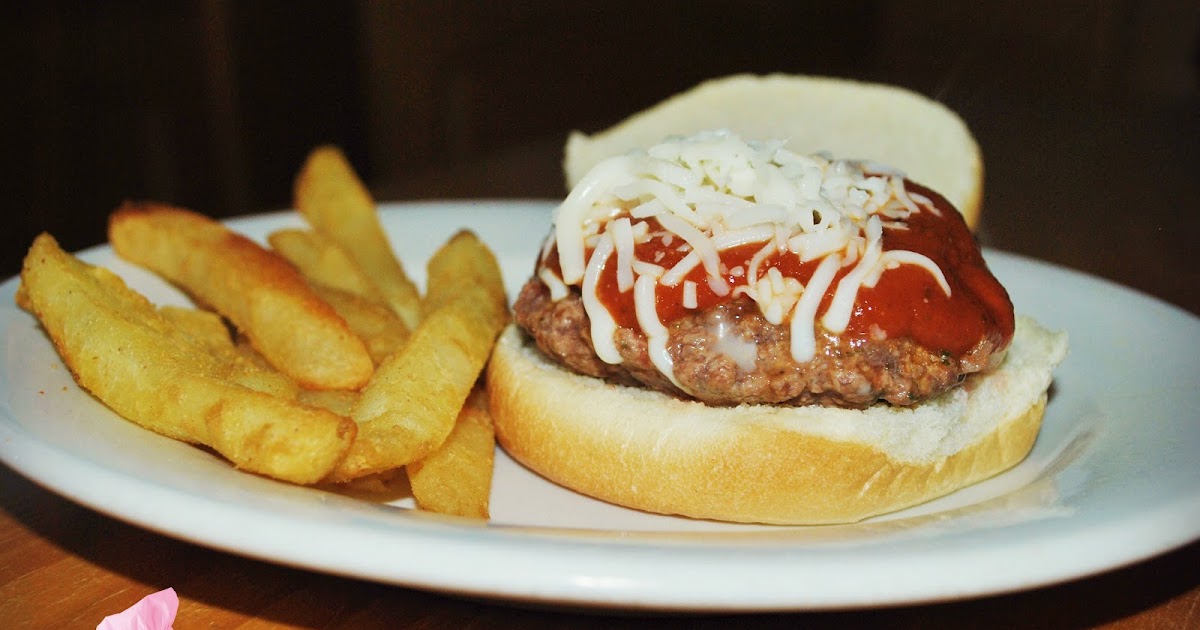 A Chick Who Can Cook Pizza Burger and garlic fries