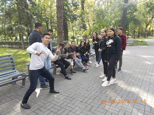 Youngsters singing near Panfilov park in Almaty.