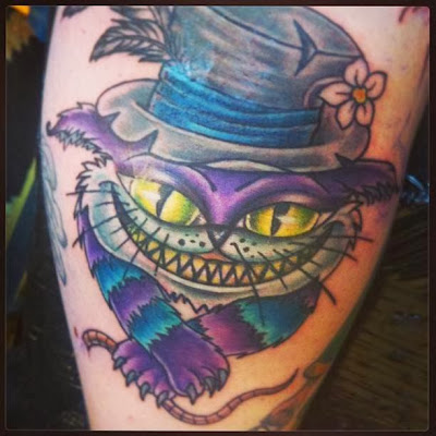 Gato sorridente usando chapéu tatuagem Gato sorridente usando chapéu tatuagem