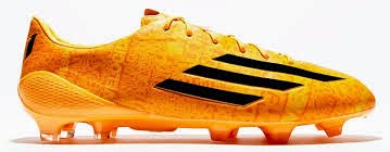 botas messi doradas