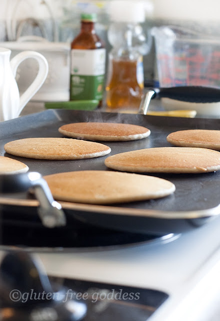 Gluten-free pancakes on the griddle.