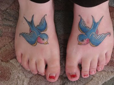 Limpat Tattoos swallow tattoo On Foot