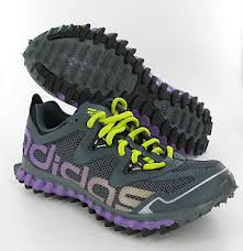 An aggressive sole creates ground-gripping, multidirectional traction for a breathable running shoe designed with strategic, supportive overlays.An aggressive.