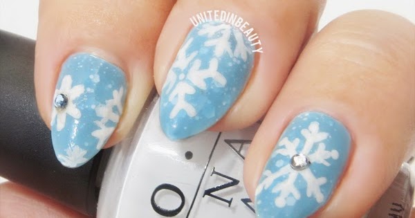 3. Frosty Blue Snowflake Nails - wide 1