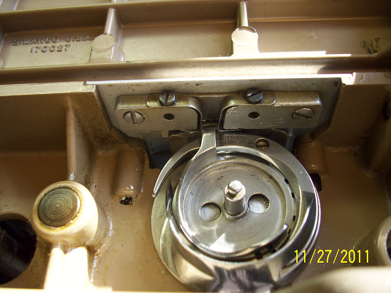 My Sewing Machine Obsession Singer 221 How to remove the bobbin case base