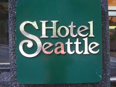 Logo for Hotel Seattle with the S very large so it looks like it should be read at the beginning of the word Hotel