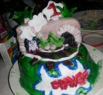 Sad Thomas the Train cake. :( sad cake, ugly background, gross setup