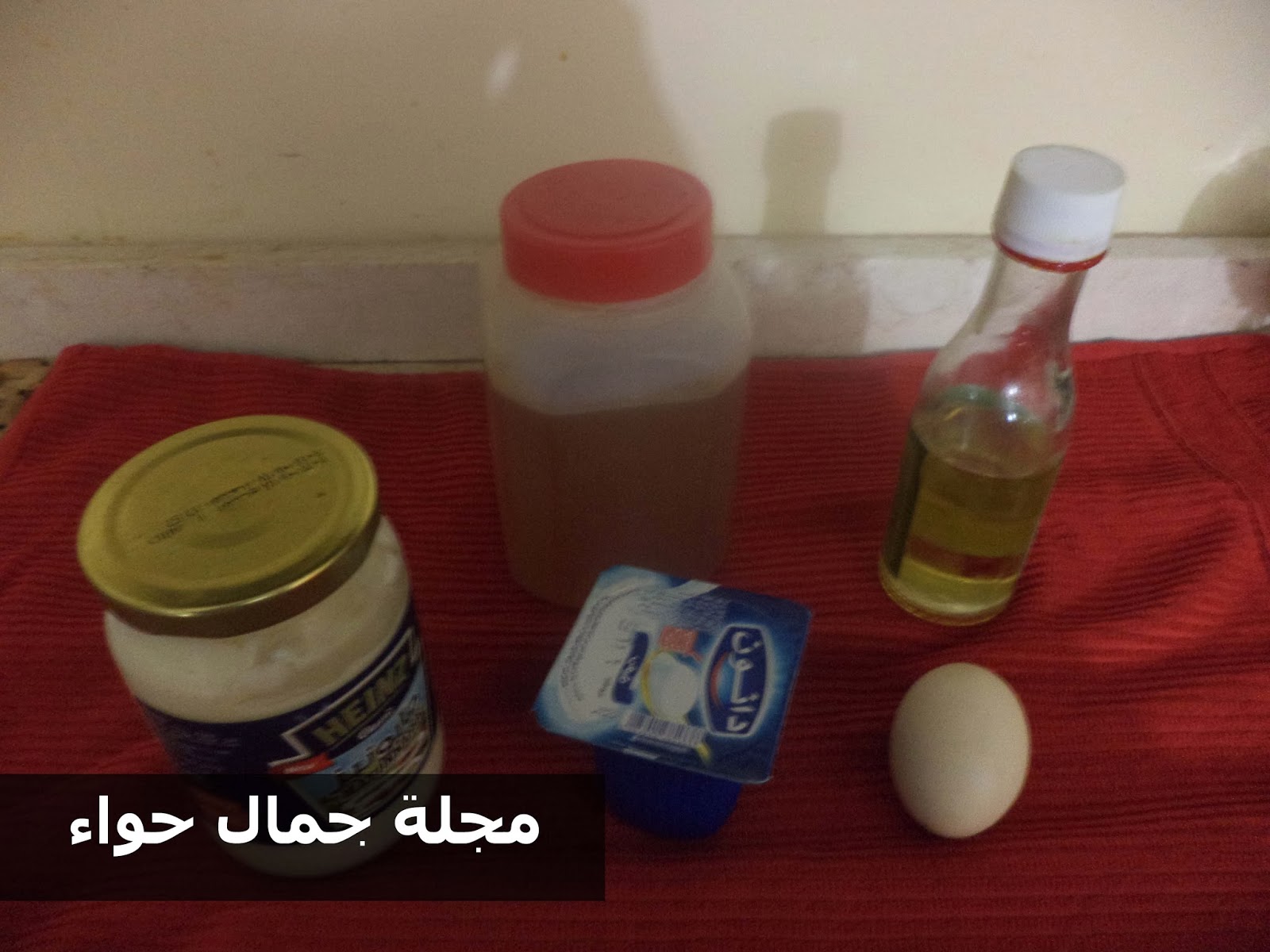 عالم حواء بالصور حمام زيت جوز الهند لشعر طويل قوى وناعم