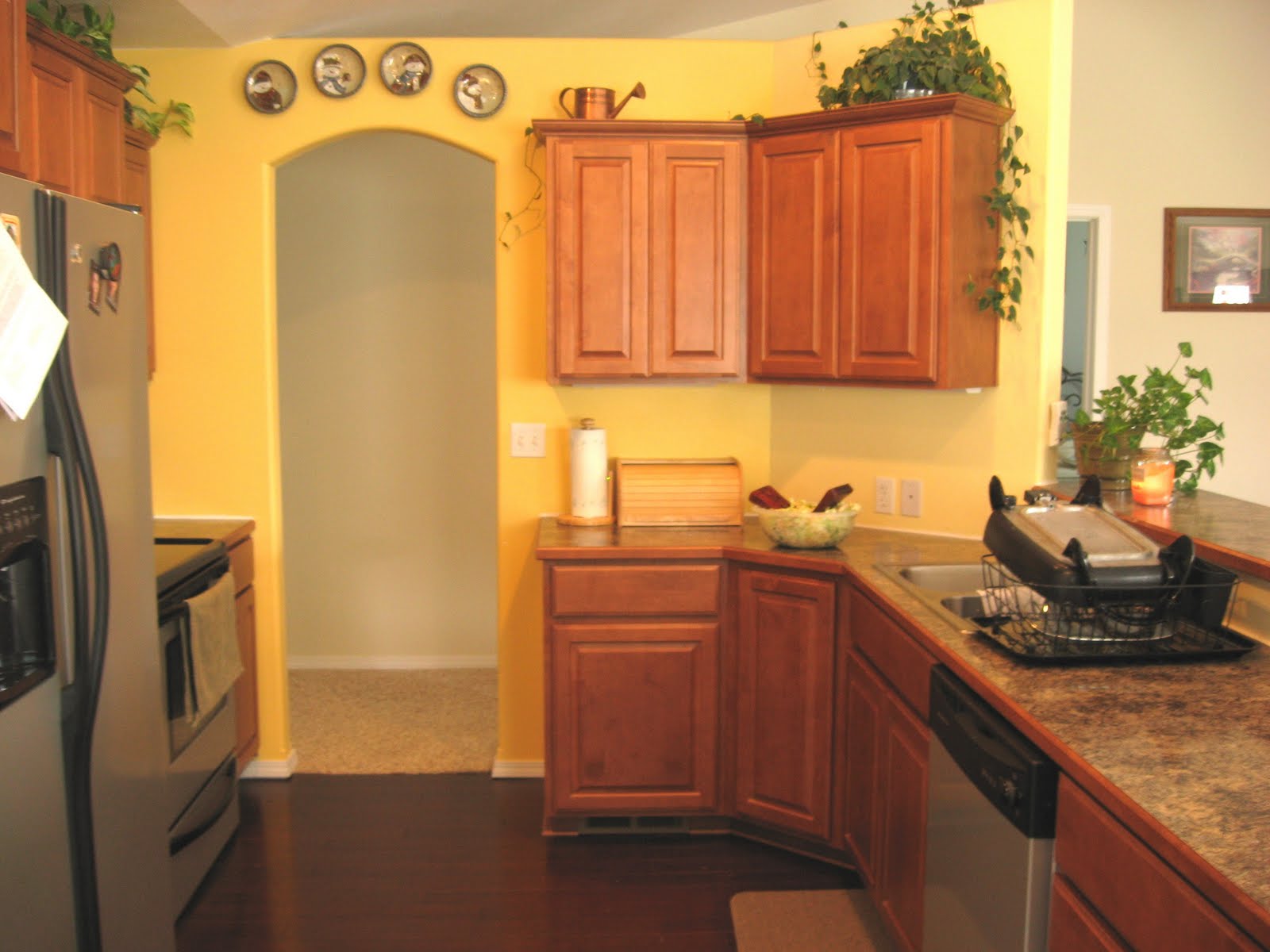 Dark cherry kitchen cabinets Yellow Kitchen Walls with Dark Cabinets