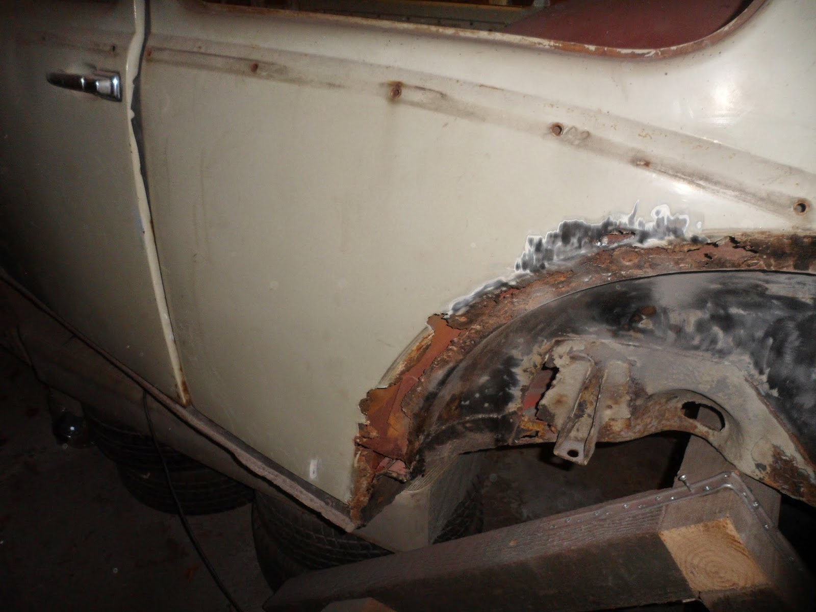 1965 VW Beetle Restoration That is one rusty rear quarter!