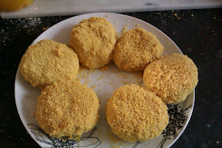 Six fishcakes, breaded and chilled ready to be cooked