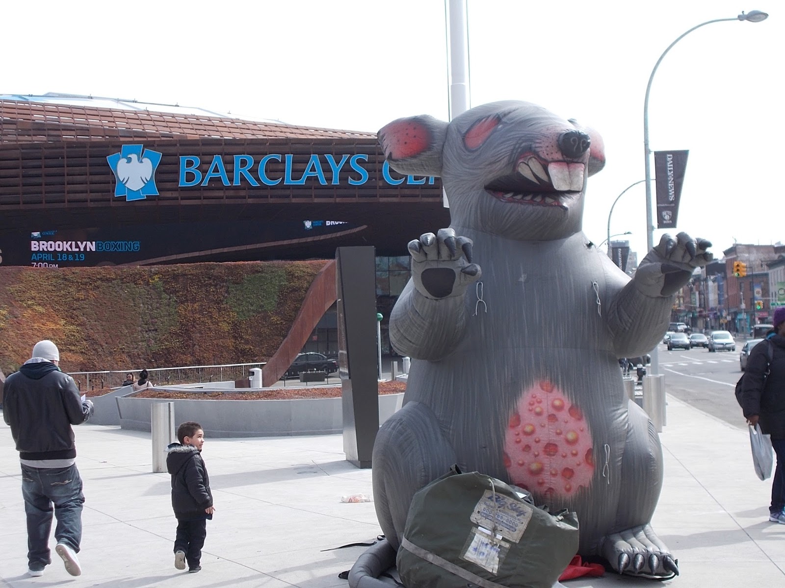Inflatable rats, symbols of union protest, placed outside the Barclays