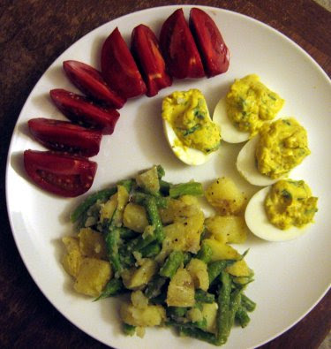 Potato green bean vinaigrette, deviled eggs, and fresh summer tomato