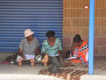 Mbali interviews participants in traditional attire