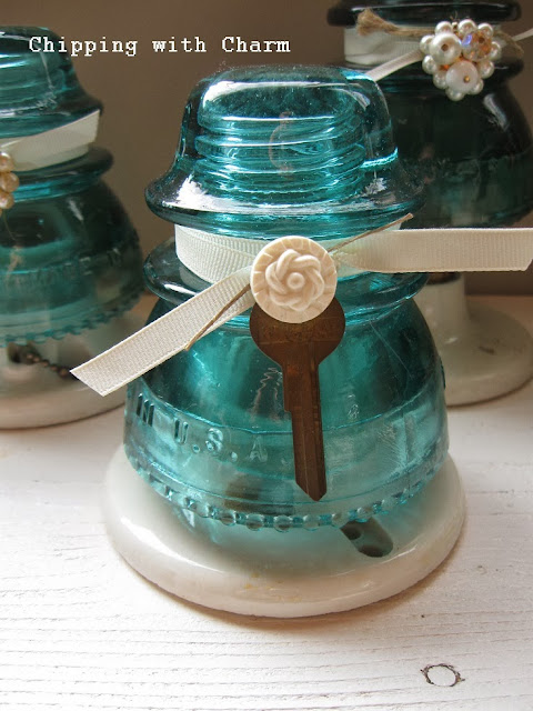 Chipping with Charm: Aqua Glass Insulator Trees...http://chippingwithcharm.blogspot.com/