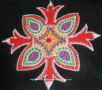 hand drawn rangoli with orange and pink colours festival-kolam-2.jpg