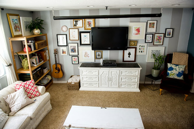 Decorating around the tv and styling and open shelf.