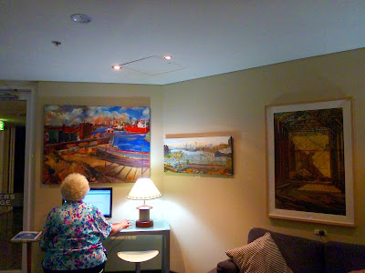 exhibition of Pyrmont paintings by industrial heritage artist Jane Bennett in the members lounge of the Australian National Maritime Museum