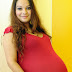 MULHER EXIBE BARRIGA DE QUÍNTUPLOS