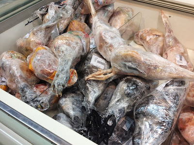 Dead, frozen, whole chickens in store in Shanghai, China