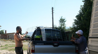 Helping Bekir unload the supplies Helping Bekir unload the supplies