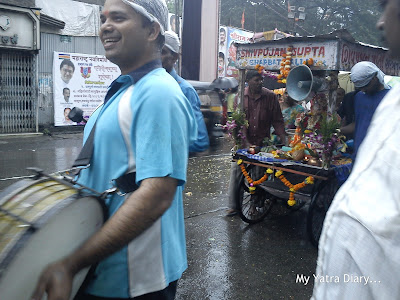 Beating of drums as Ganpati idols are taken for visarjan in carts