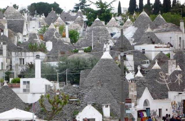 Alberobello a Unique Italian Village Alberobello, the city of drystone dwellings known as trulli , is an exceptional example of vernacular architecture. It is one of the best preserved and most homogeneous urban areas of this type in Europe. Its special features, and the fact that the buildings are still occupied, make it unique. It also represents a remarkable survival of prehistoric building techniques.