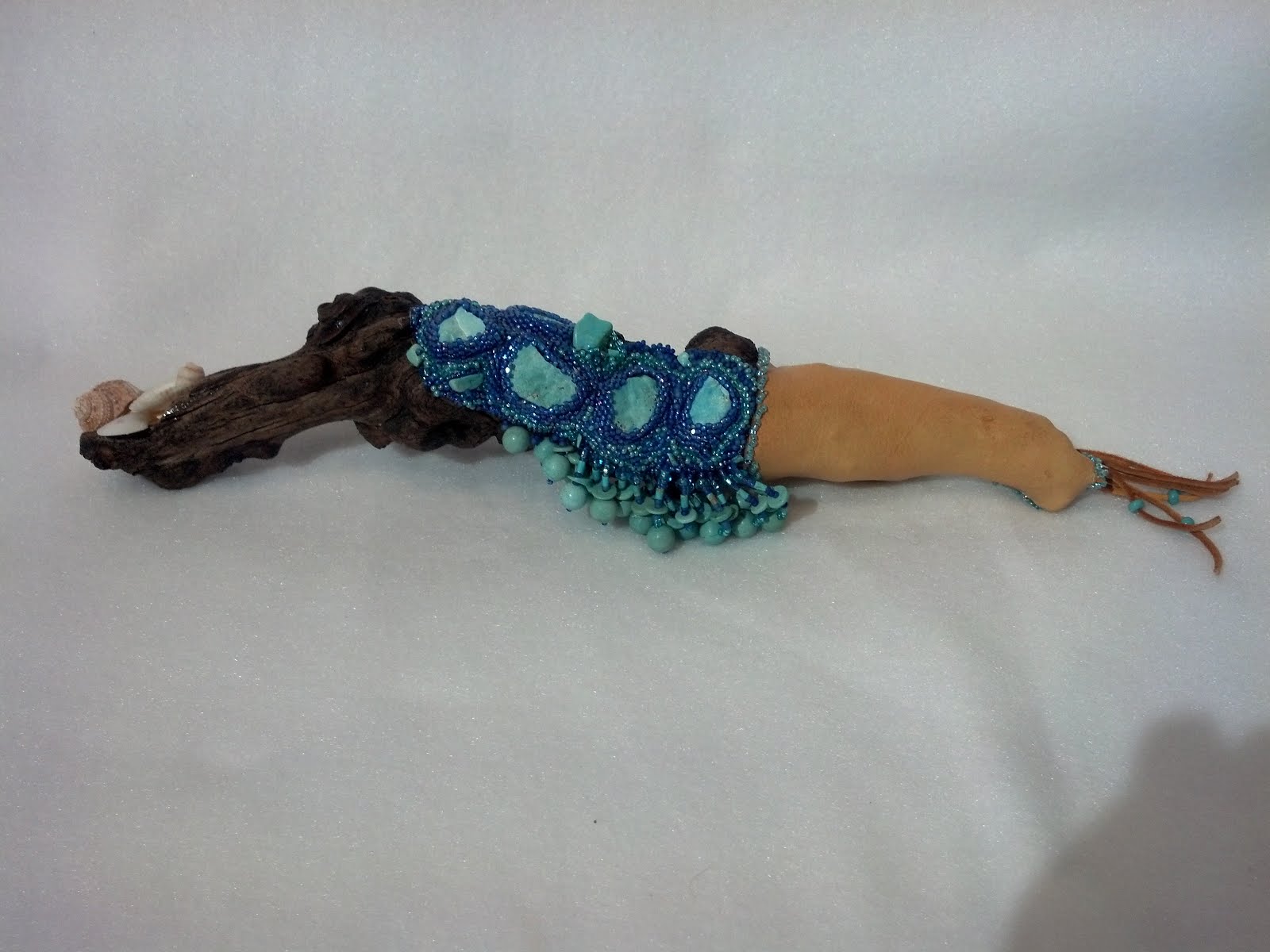 Talking stick with deer hide handle