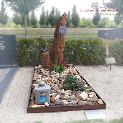 Grafmonument versteend hout met cortenstaal