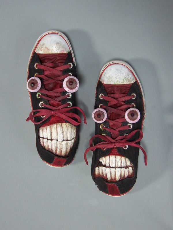 shoe on face
