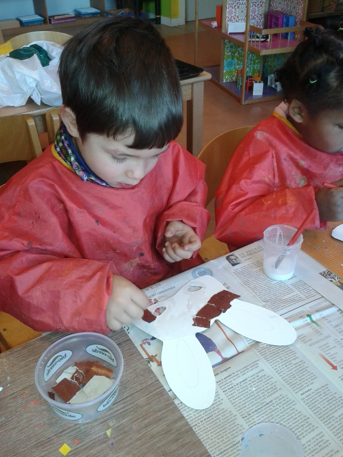 Masker maken/scheuren en plakken