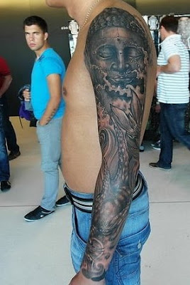 buddha tattoo design on the arm