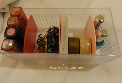 Daiso plastic storage case with pink dividers