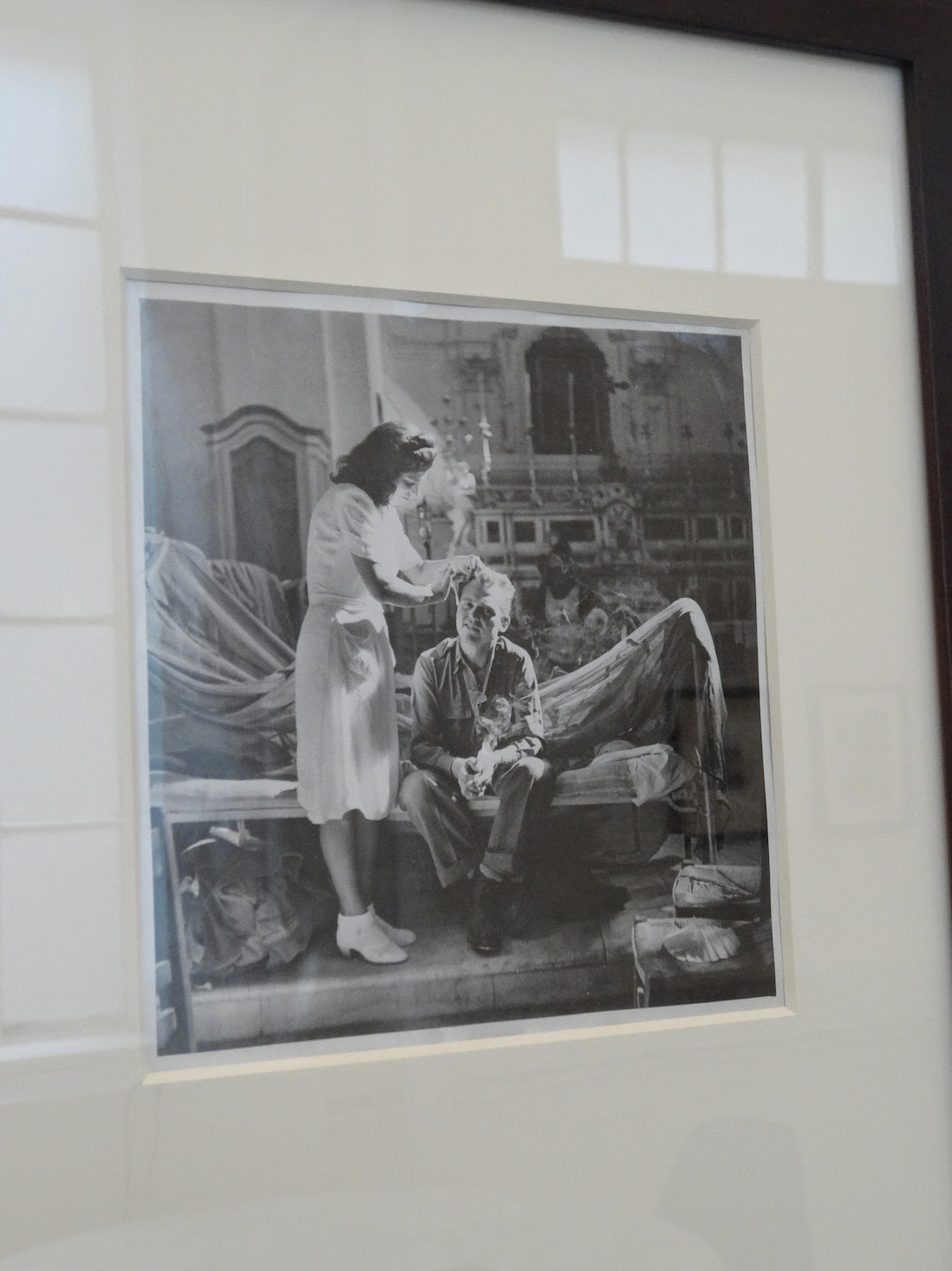 Robert Capa - Surgery Replaces Religion, Maiori, Italy Robert Capa - Nurse puts bandage on soldiers head inside a church