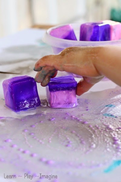 Painting with ice chalk and oil - sensory art for toddlers