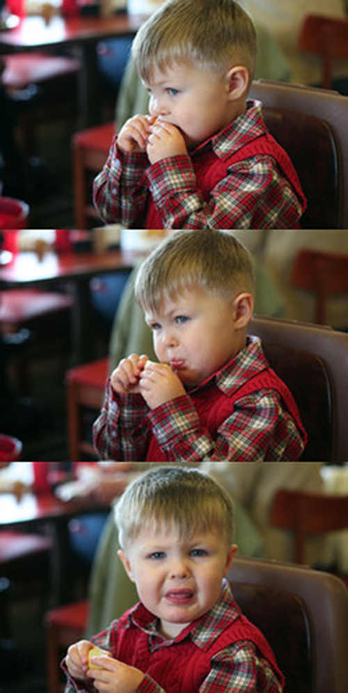 funny pictures when baby eating citrus