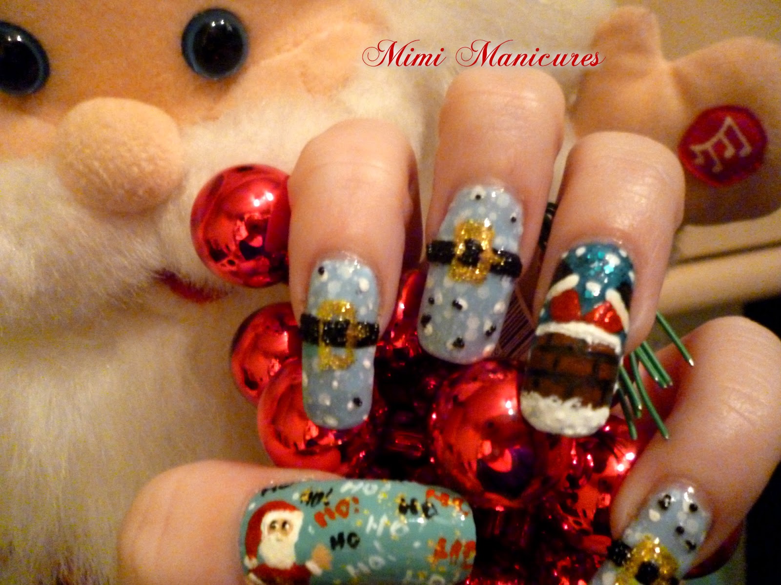 my adventures in nail polish Mimi is back...with Santa nails!