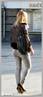 Girl wearing black leather jacket