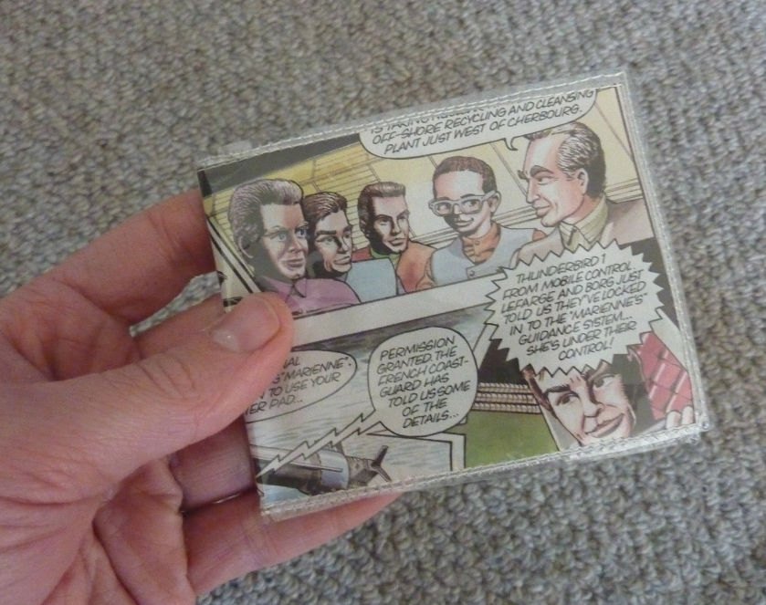 Jovial Spondoodles Sewing with laminated paper, and vinyl wallets from