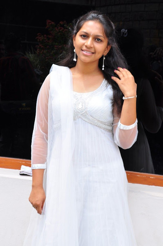 Sri  New Telugu Heroine PicsPhotos white dress cleavage