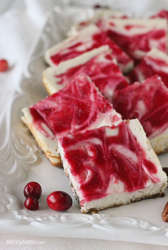 Skinny Cranberry Swirl Cheesecake Squares Cheesecake squares with a cranberry swirl and a gingersnap pecan crust – so good, less guilt and perfect for the Holidays!