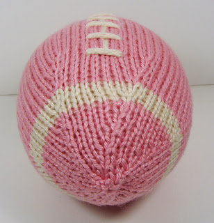hand knit football stuffed pink white