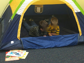 reading in a tent (Brick by Brick)