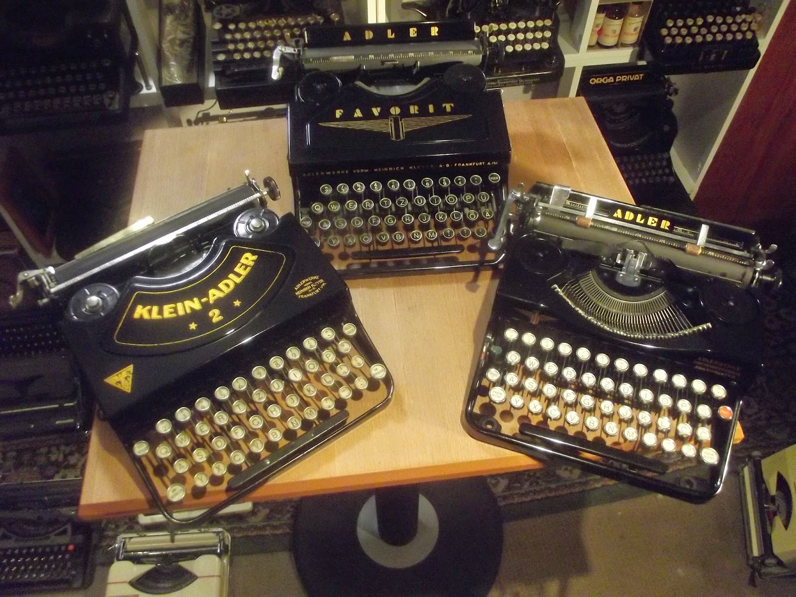 oz.Typewriter Three Adler Portable Typewriters on their way to a G O O